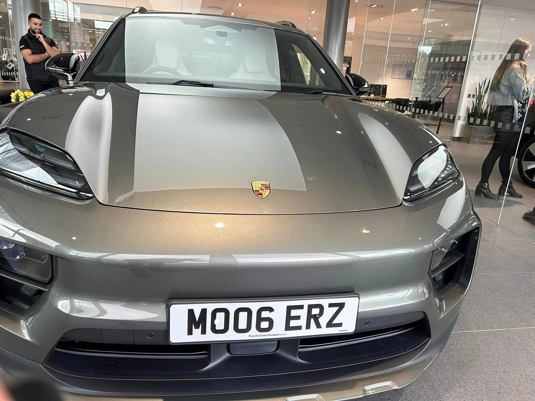 Aventurine Green Macan EV with OffRoad Package + Black Roof Rails